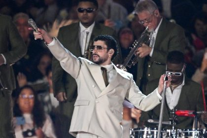 Bad Bunny poses for a Super Bowl Halftime Show promo.