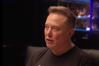 Elon Musk speaks on a podcast