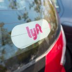 Sticker for Lyft on the back of a Lyft ride sharing vehicle in the Silicon Valley town of Santa Clara, California, August 17, 2017. (Photo via Smith Collection/Gado/Getty Images).